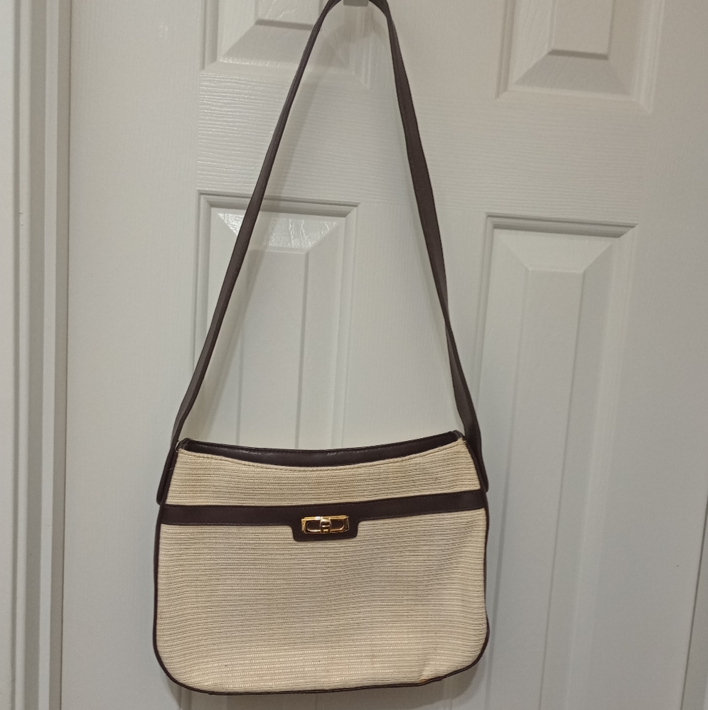 Aigner straw with leather trim handbag.